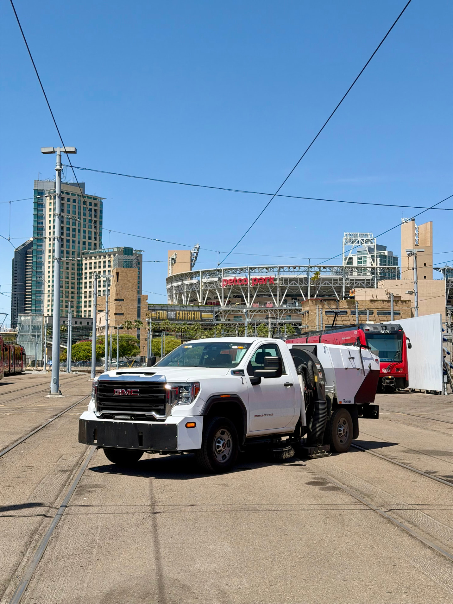 KleanPoint power sweeping truck working at a commercial property